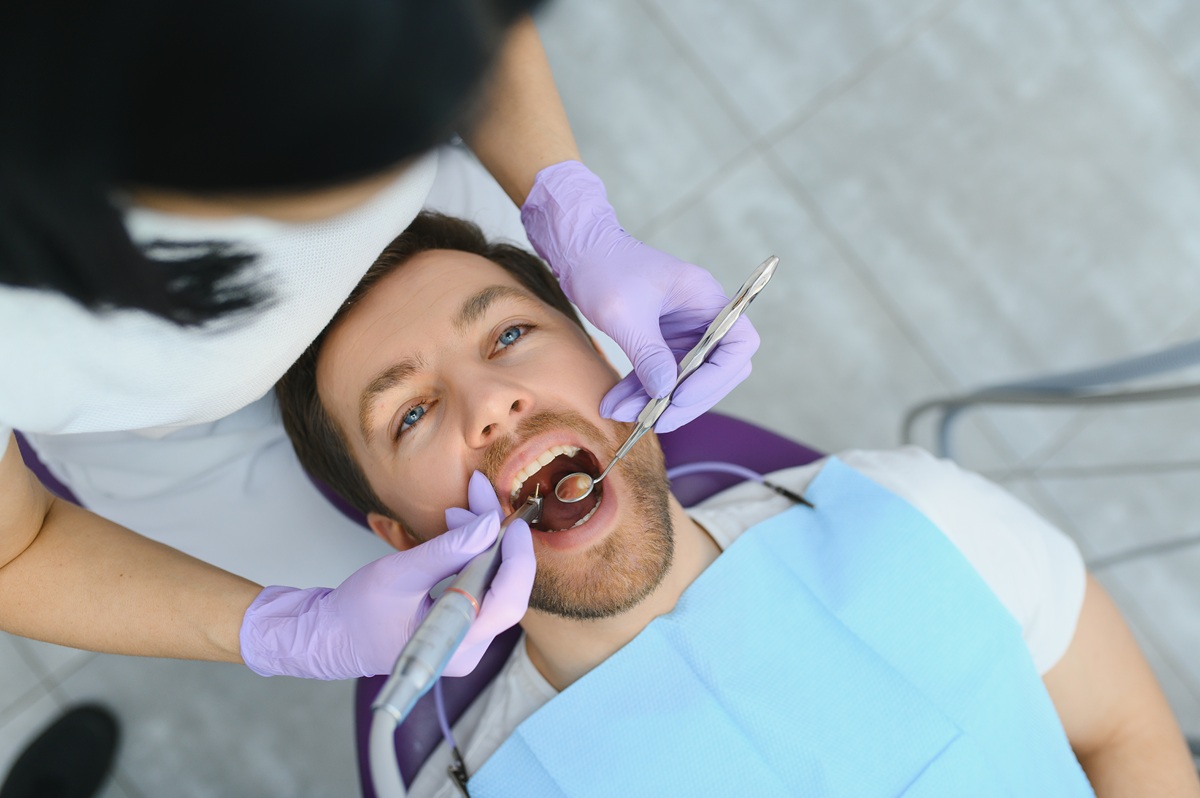 Patient receiving a routine dental check up
