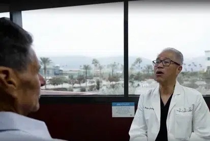 Emergency dentist upland consulting patient during urgent dental visit